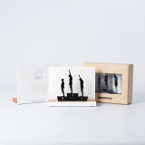 Figure "Black Power · Podium de Mexico 68" à côté de son coffret et de sa boîte cadeau