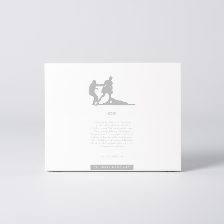 Sleeve of the figure "Boxing · Knockout with the referee" with the text explaining the silhouette