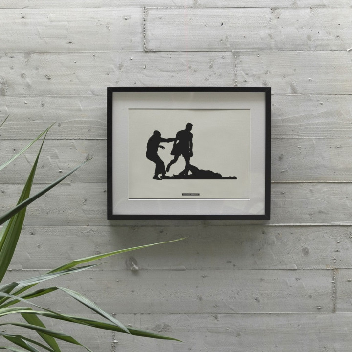 Affiche "Boxe · K.-O. avec l'arbitre" encadrée et accrochée au mur