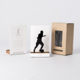 Figure "Football · Conduite de balle" à côté de son coffret et de sa boîte cadeau