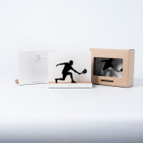 Figure "Padel · Joueur en extension" à côté de son coffret et de sa boîte cadeau