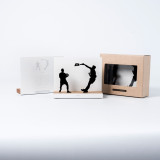 Figure "Padel · Paire au smash" à côté de son coffret et de sa boîte cadeau
