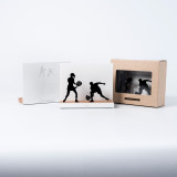 Figure "Padel · Paire mixte" à côté de son coffret et de sa boîte cadeau