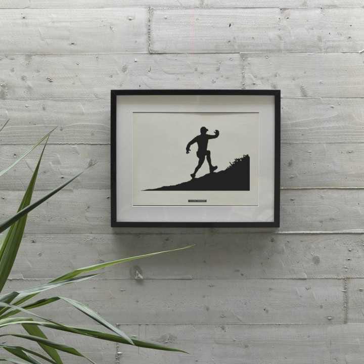 Print "Trail running · Climb up the hillside" framed and hanging on a wall