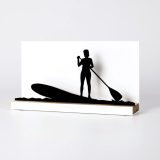 Figure "Paddle surf · Stand-up paddler", angled view showing its oak base