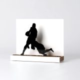 Figure "Rugby · Tackling the ball carrier", angled view showing its oak base