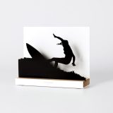 Figure "Surfing · Turn with the board held high", angled view showing its oak base