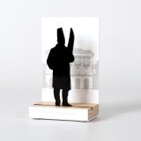 Figure "HEAD COOK WITH KNIFE", angled view showing its oak base