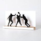 Figure "Handball · Attacker between two defenders", angled view showing its oak base