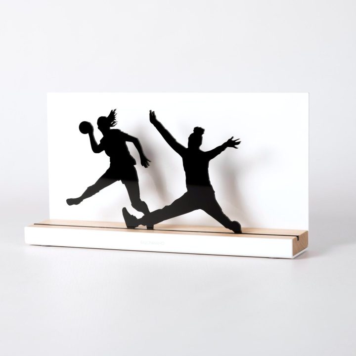 Figure "Handball · Three players, shot at the goalkeeper", angled view showing its oak base