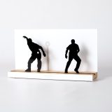 Figure "Basque pelota · Pair of pelotaris on guard", angled view showing its oak base