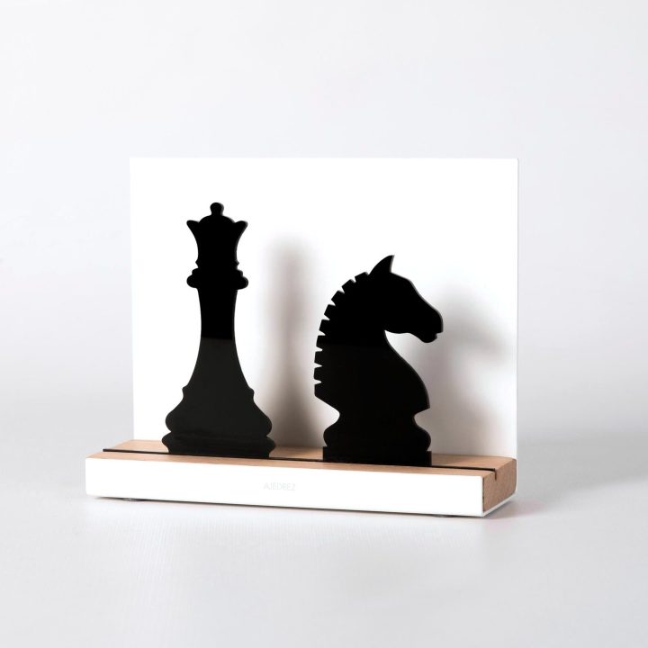 Figure "Chess · Queen and knight", angled view showing its oak base