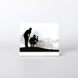 Figure "Golf · Reading the green" against a wall background