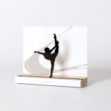 Figure "Rhythmic gymnastics · Standing split", angled view showing its oak base