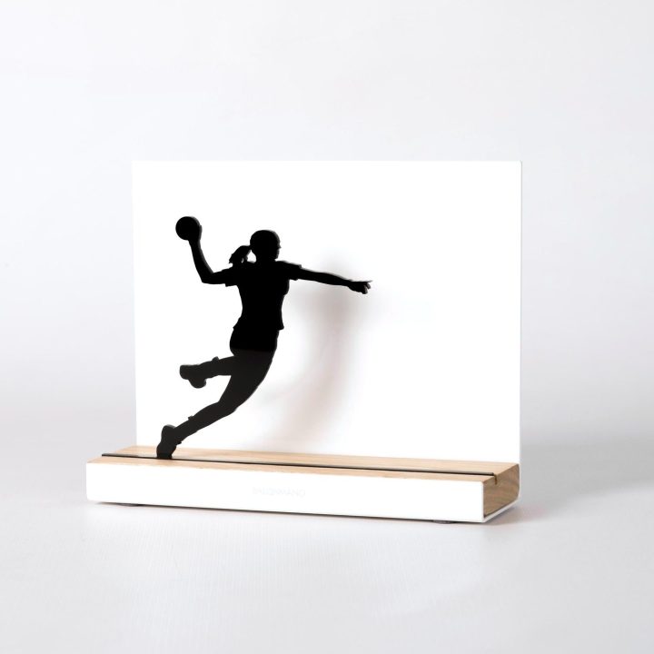 Figure "Handball · Women's jump shot", angled view showing its oak base