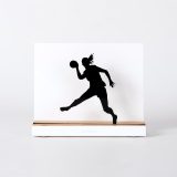 Figure "Handball · Ponytailed player leaping", front view