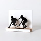 Figure "Field hockey · Duel between women players", angled view showing its oak base