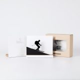 Figure "Skiing · Downhill run" next to its sleeve and its gift box