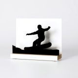Figure "Snowboard · Ollie-pop takeoff down the slope", angled view showing its oak base