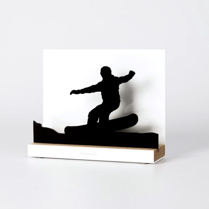 Figure "Snowboard · Ollie-pop takeoff down the slope", angled view showing its oak base