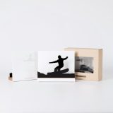 Figure "Snowboard · Ollie-pop takeoff down the slope" next to its sleeve and its gift box