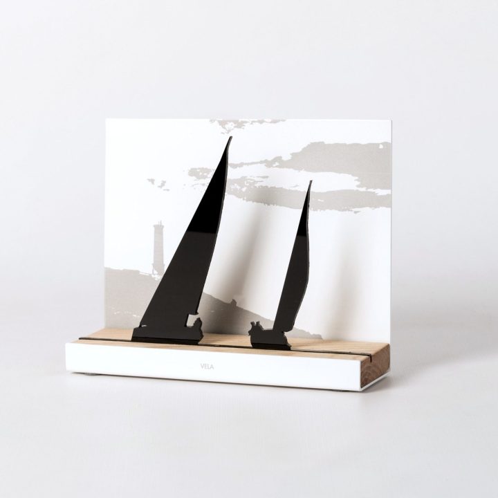 Figure "Sailing · Two sailboats under way", angled view showing its oak base