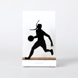 Figure "Basketball · Woman player dribbling", front view