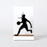 Figure "Basketball · Woman player dribbling", front view