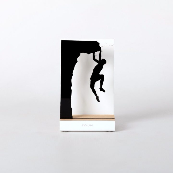 Figure "Climbing · Hanging from the ledge" against a wall background