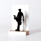 Figure "Golf · Golfer with the bag on the shoulder", angled view showing its oak base