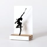 Figure "Rhythmic gymnastics · Gymnast with clubs", angled view showing its oak base