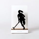 Figure "Hockey sur gazon · Joueuse à la queue-de-cheval", vue de face