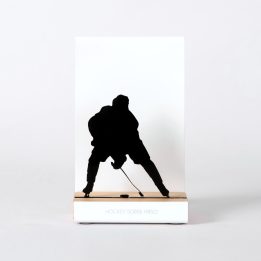 Figure "Ice hockey · Player facing forward with the puck", front view