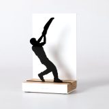 Figure "Jai alai · Cesta held high", angled view showing its oak base