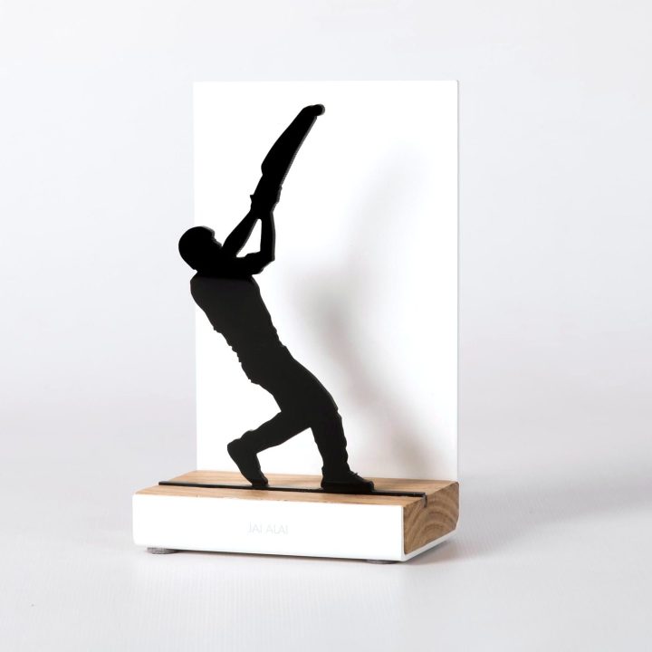 Figure "Jai alai · Cesta held high", angled view showing its oak base