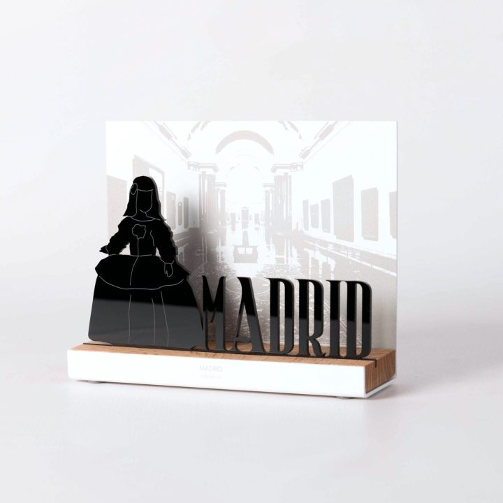 Figure "Menina with Madrid lettering", angled view showing its oak base