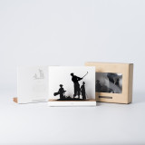 Figure "Golf · Trio vintage avec caddie" à côté de son coffret et de sa boîte cadeau